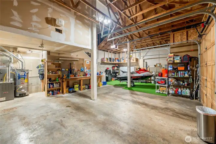 3-car garage with more storage space and extra high ceiling