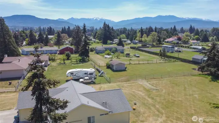 Beautiful grounds with mountain views 2.1 acres with two houses and 2 detached garages and one large workshop