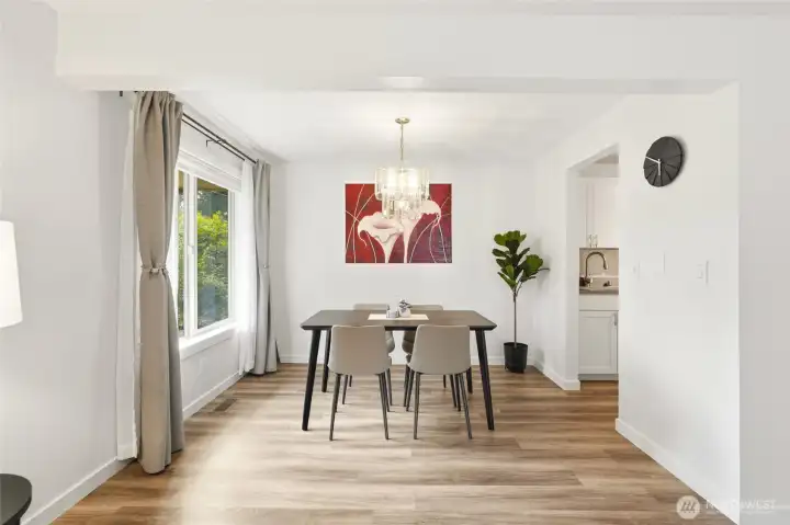 This space could also house a dining table for 6. This space could also house a dining table for 6.