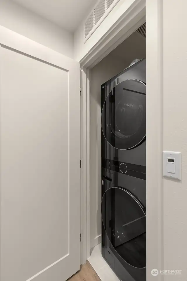 A convenient W/D closet resides on the middle level!