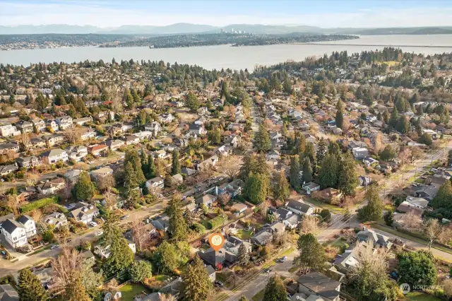 Aerial photo looking south and east. You can see Lake Washington, 520 bridge and the  Bellevue skyline. Sought after View Ridge / Hawthorne Hills location. Walking distance to grocery stores, cafes, parks & Burke Gilman Trail. Only minutes to Children's, the UW, downtown, 520, and Amazon. Located in the #1 sought after school cluster! Location, location, location!