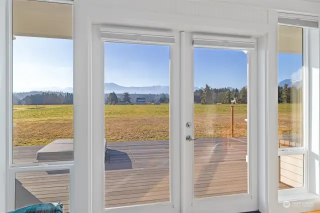 French doors onto deck with hot tub