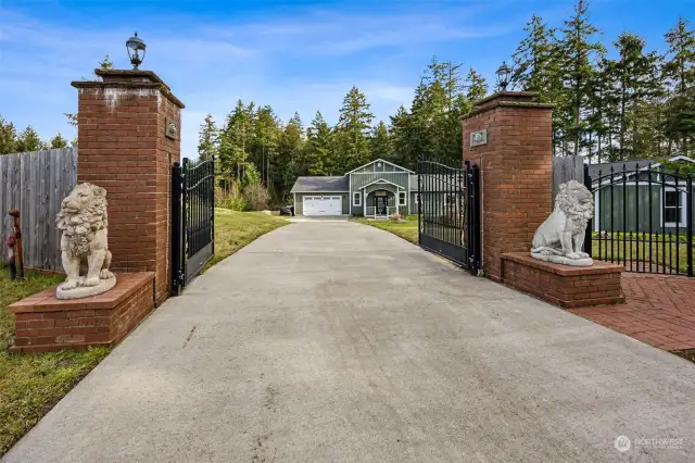 Enjoy privacy unparalleled thanks to the fully fenced and gated lot for this home. With 2.36 acres, this estate style setup provides an extra layer of security and peace of mind with thoughtful additions of a generator that stays with the home and security cameras along with an app-connected Ring doorbell.