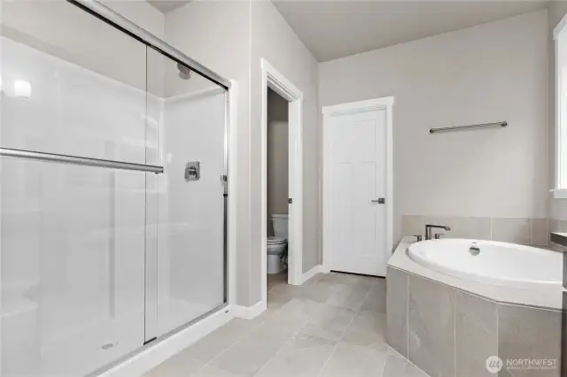 primary bath also comes with its own linen closet