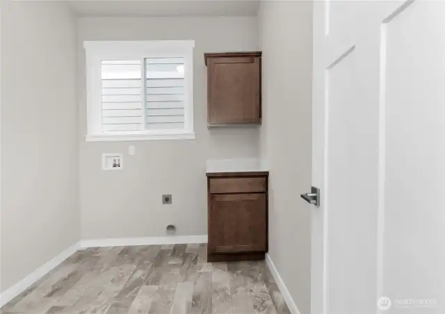spacious laundry room with lots of natural light. Photo from similar plan on different lot, features may vary