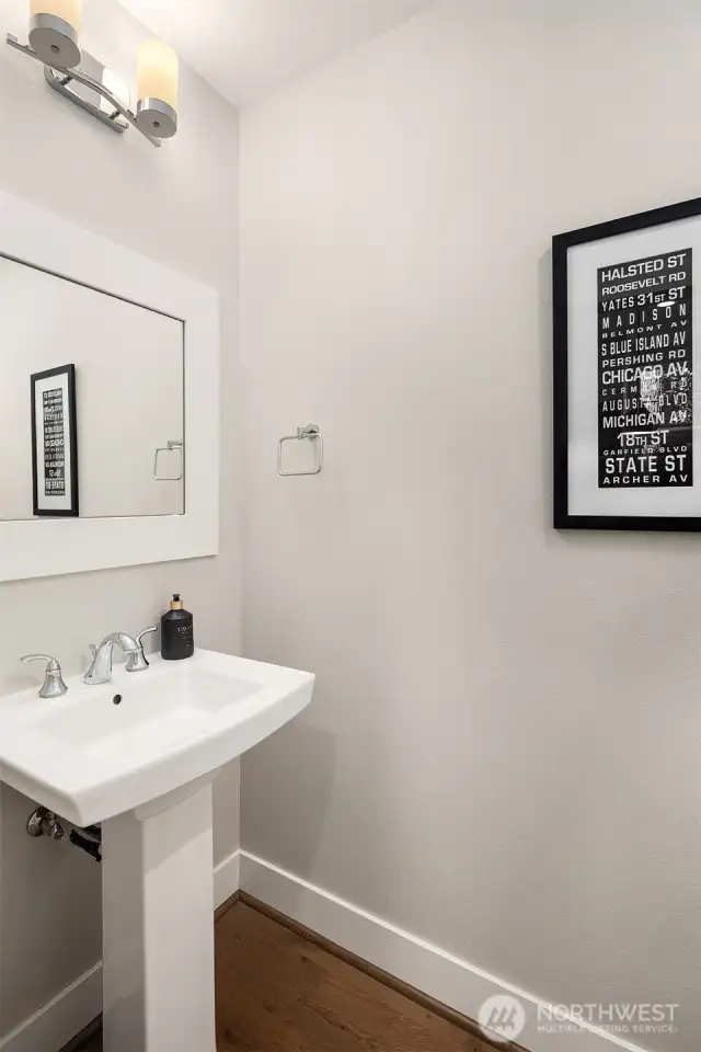 A conveniently located powder room on the main floor adds ease for you and your guests.