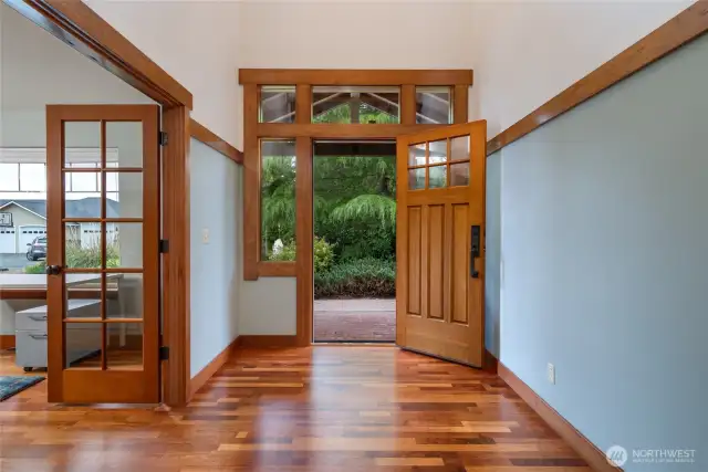 Wide foyer/large front door/ office on right