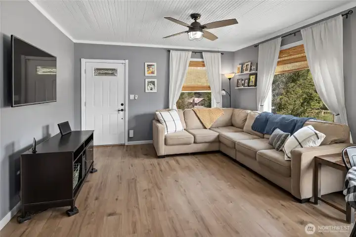 Living space opens to the front deck, great for BBQ's.