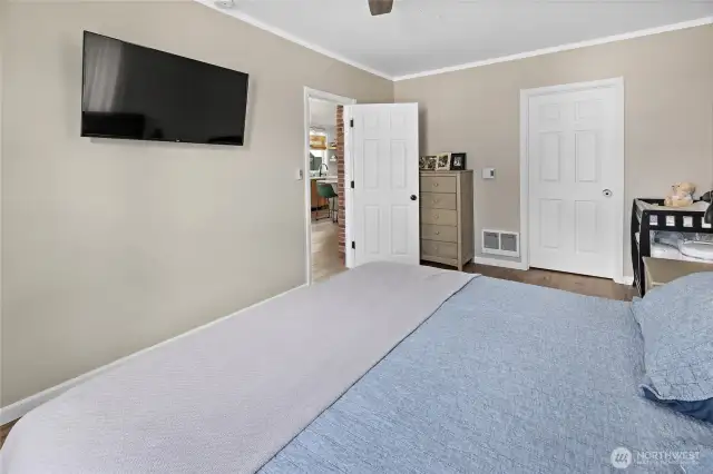 Main floor large bedroom with walk-in closet.