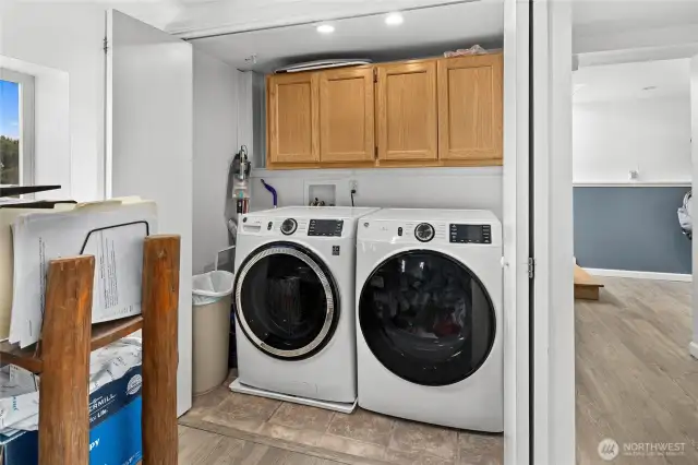 Basement hosts the laundry area, and there is also a spot here plumbed for a future wet bar.