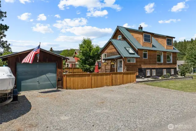 TONS of off street parking + garage. Also being a corner lot provides extra parking too!
