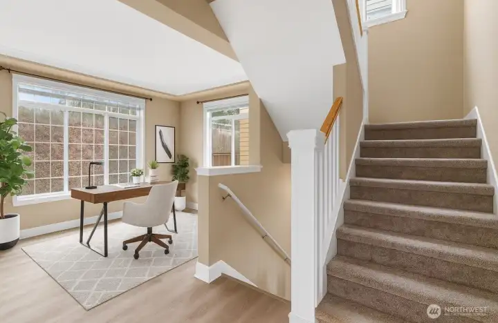 Another option for this space could be a den? *virtually staged*