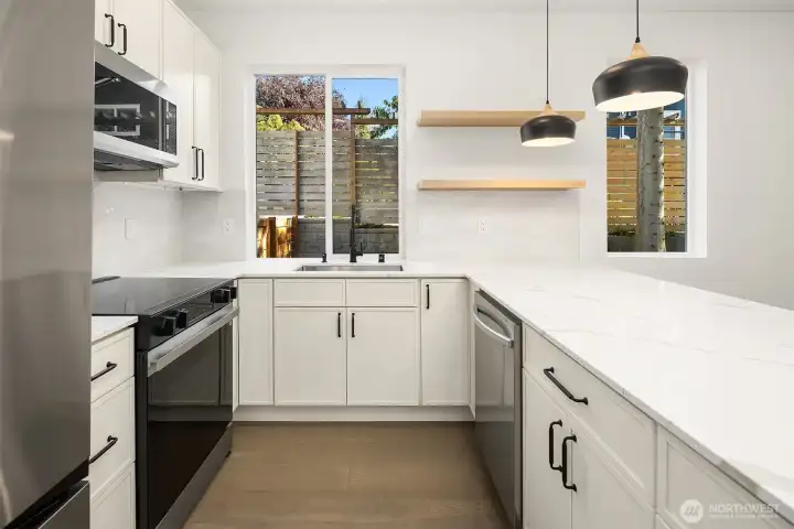 Well appointed kitchen with Samsung appliance package.