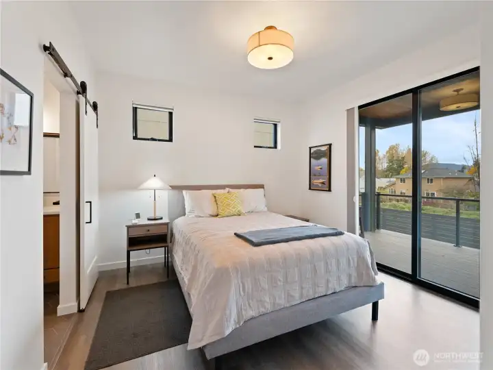 Main floor owner's suite overlooks the pond.