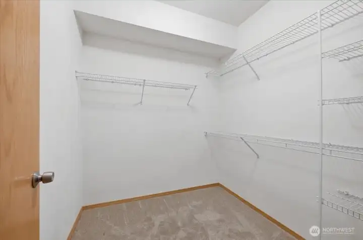 Primary walk in closet.