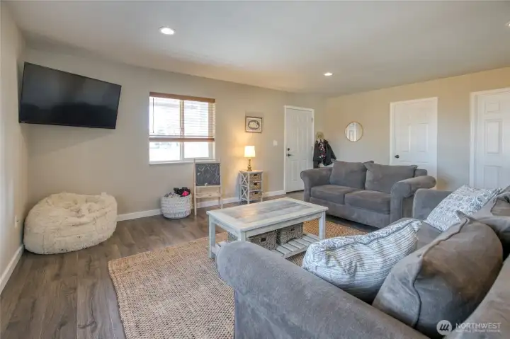 Spacious layout with abundant natural light and a neutral color palette throughout the living area.