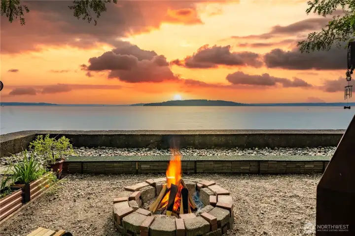 Enjoy iconic sunsets over Puget Sound in this sought-after Normandy Park waterfront setting.