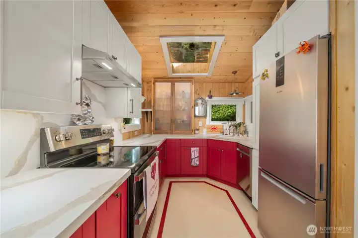 Prepare meals in a well-appointed kitchen with ample workspace.