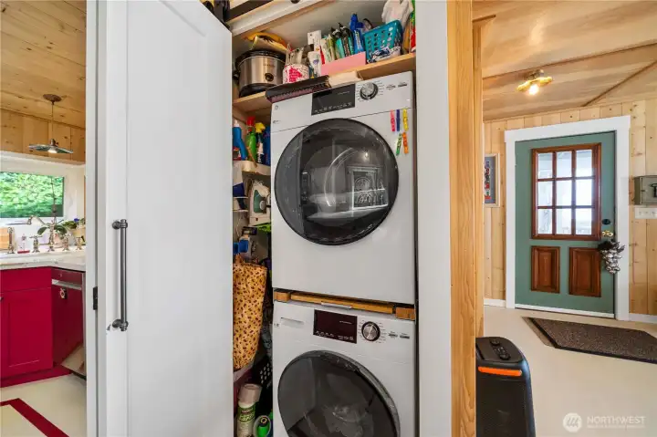 Laundry and storage conveniently tucked within the home.