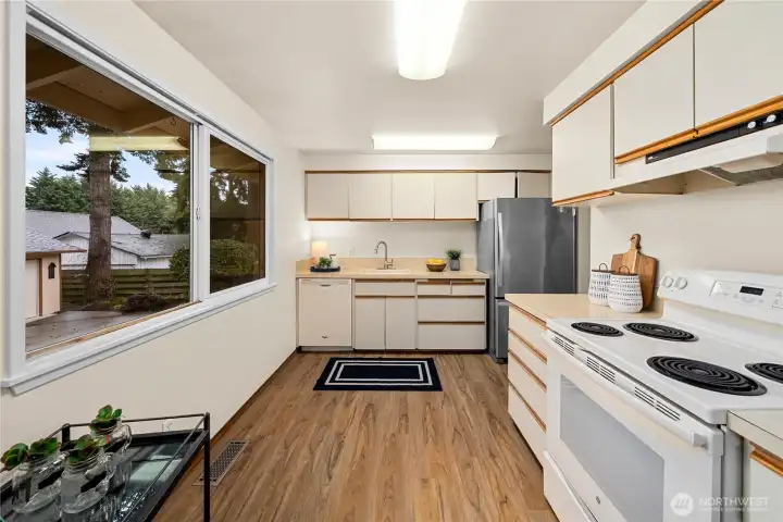 Charming window overlooking the backyard.