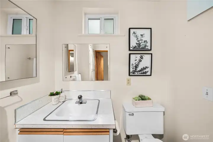 3/4 bathroom with storage.