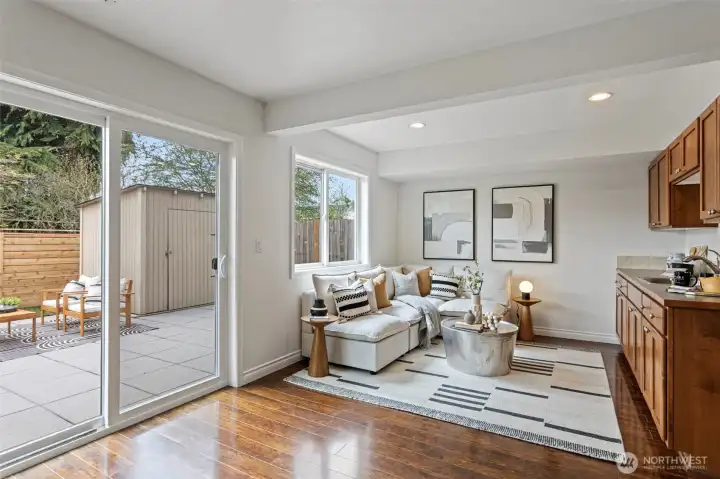 Relax in this spacious lower level rec room with partial kitchen, how convenient.  There is a range plug-in should someone want a full kitchen.