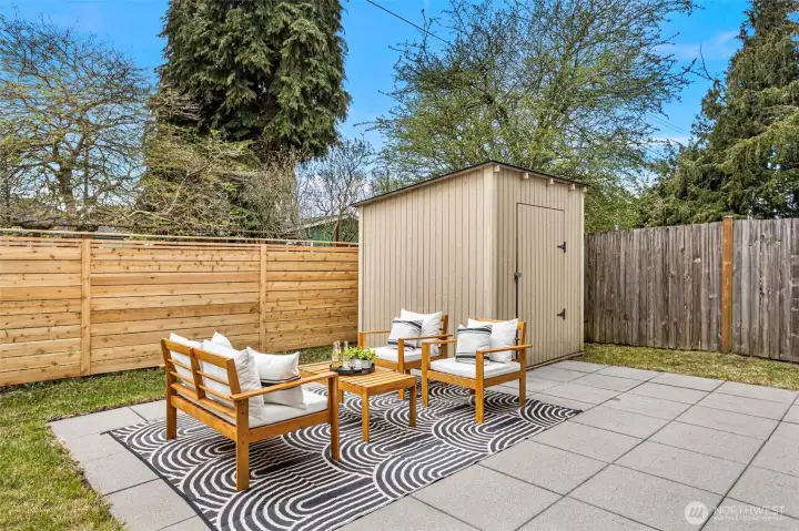 Enjoy the fenced backyard with huge patio for entertaining and relaxing.