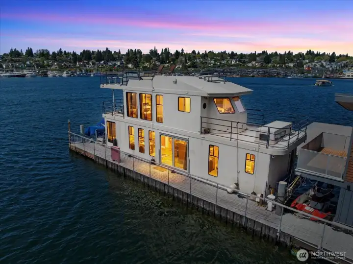 Views towards the West with spectacular sunsets and unobstructed views of the city. End of the dock location and you own the space with very low HOD's that include water, garbage and power. . Price includes the purchase of the houseboat and owned condo slip...
