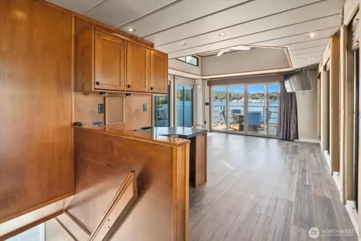 Upstairs Bonus room with skylight, ceiling fan and built in office... Located off a covered deck, with spiral to the rooftop deck.