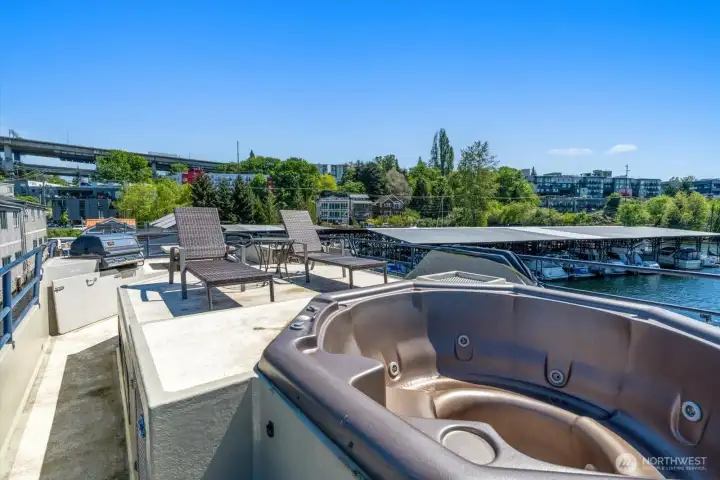 The rooftop deck is stunning, and has a jetted hot tub.