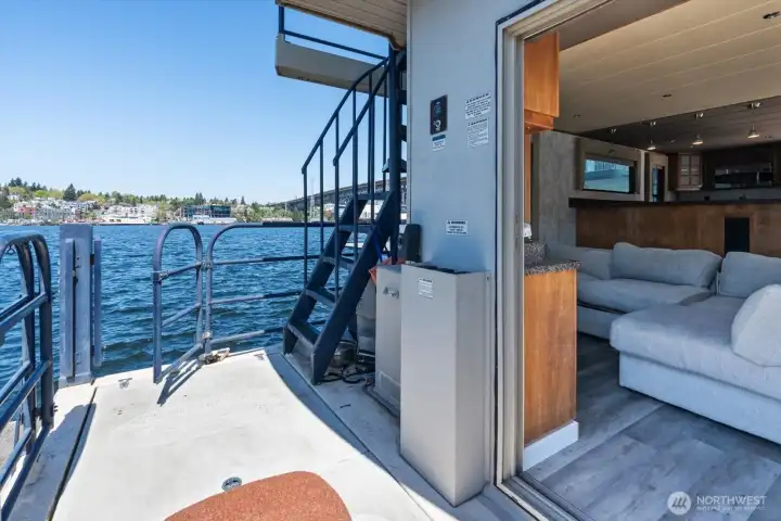 Access off the boat with stairs to get back on after a swim... The stairs go all the way to the rooftop deck...