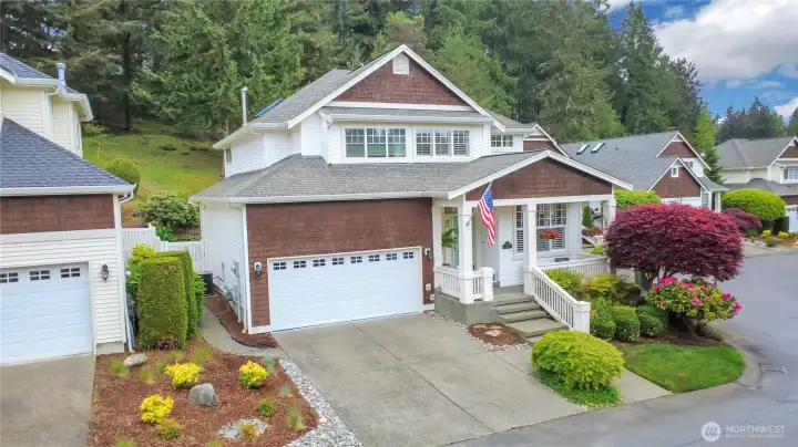 The property captures territorial views while backing directly to a serene 10-acre greenbelt.