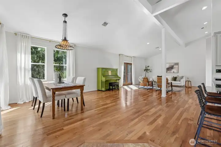 Kitchen & Dining areas, eating island, Hardword & tile floors, vaulted ceilings, French doors to 2nd deck, skylights