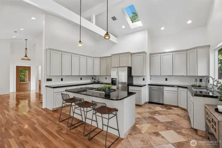 Kitchen, Tile floors, high ceilings, skylights