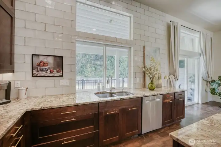 Incredible subway tile extends all the way to the ceiling.