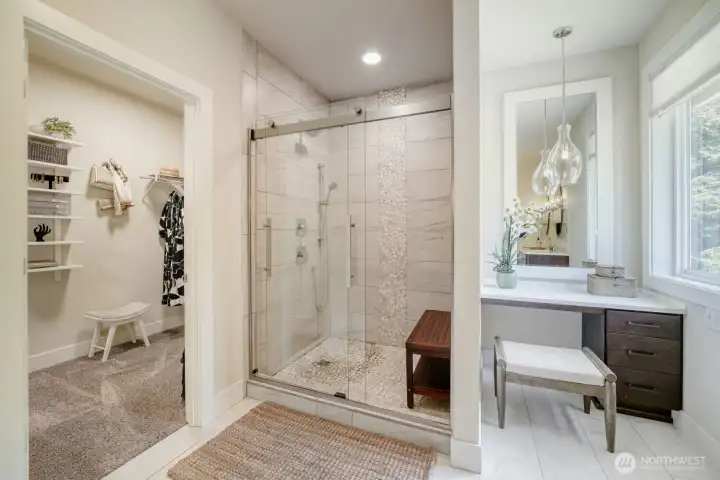 The primary bath is luxurious retreat.