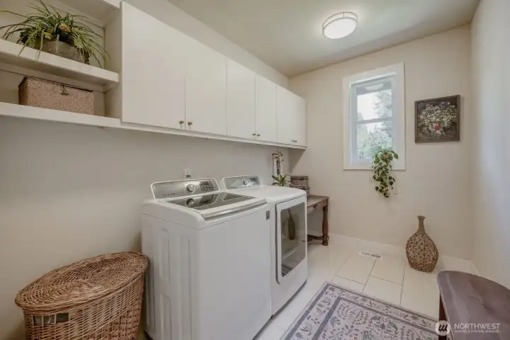 Doesn't everyone want a generous laundry room? Here it is.