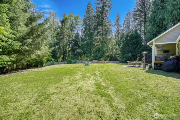 A huge, level yard. An in-ground sprinkler system has been prepped, but not finished.