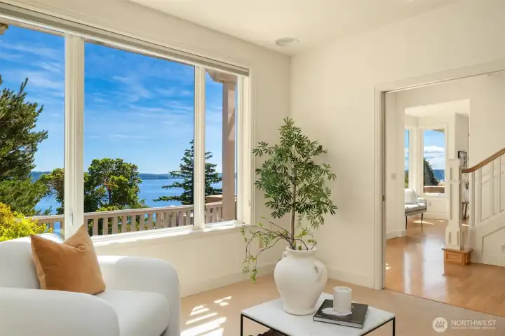 The living room flows into a separate family room.