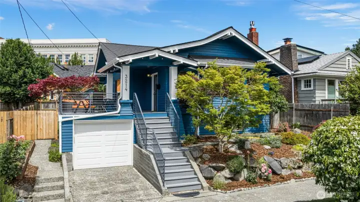 A distinguished Mt. Baker Craftsman that is elevated above the street, framed by mature multi-tiered landscaping, and full of character from the first step up. A distinguished Mt. Baker Craftsman that is elevated above the street, framed by mature multi-tiered landscaping, and full of character from the first step up.
