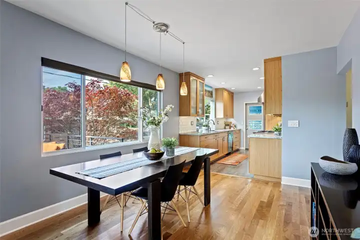 Spacious enough for a real dinner party, the dining room connects effortlessly to both the living room and kitchen. Spacious enough for a real dinner party, the dining room connects effortlessly to both the living room and kitchen.