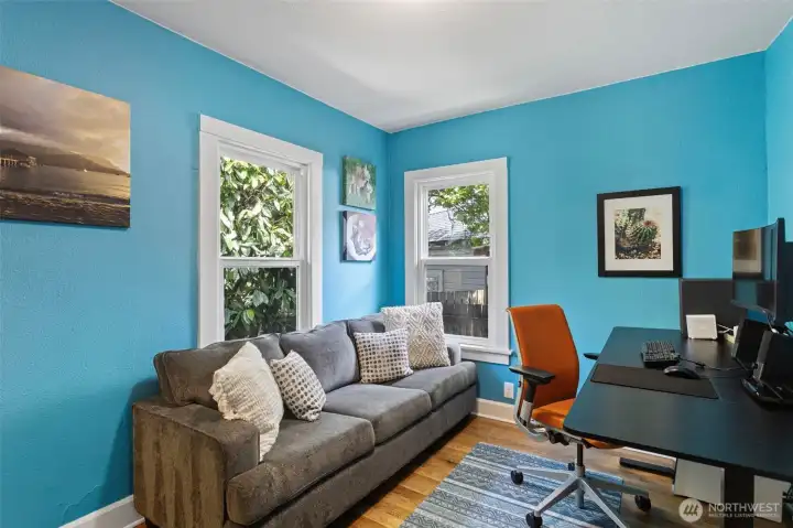 The second main level bedroom is intimate and versatile. It's a natural fit for a home office, guest room, or creative space. The second main level bedroom is intimate and versatile. It's a natural fit for a home office, guest room, or creative space.