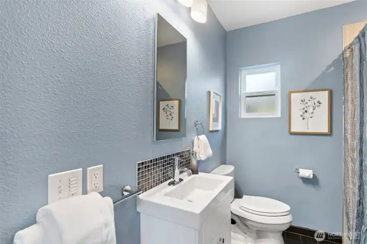 The main level bathroom. The main level bathroom.