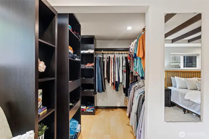 A custom walk-in closet that gives every shirt, shoe, suit, and dress its proper place. A custom walk-in closet that gives every shirt, shoe, suit, and dress its proper place.