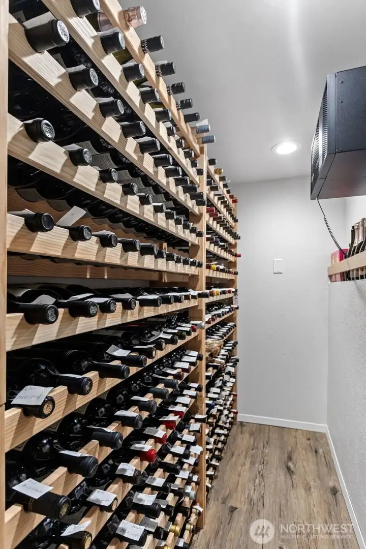 300-bottle climate-controlled wine cellar. 300-bottle climate-controlled wine cellar.