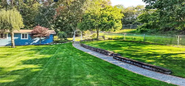 ONE OF MANY EXTRA TOUCHES - ARBOR & BRICK WALKWAY FROM MAIN TO PRIVATELY SET GUEST HOME AND CREEK