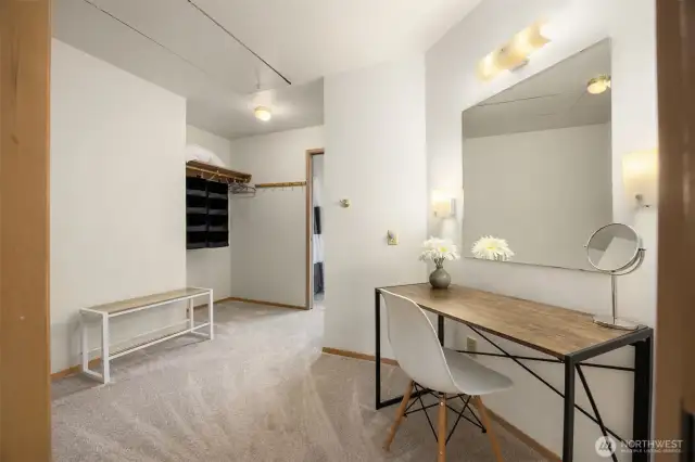 Primary closet opens up to the bathroom.