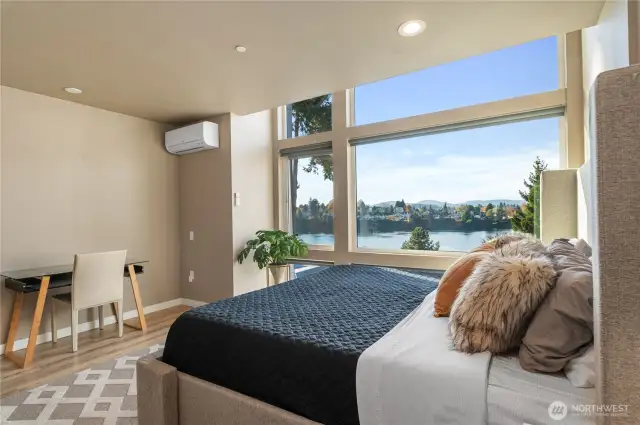 Up one level to the the primary suite with incredible Puget Sound views.