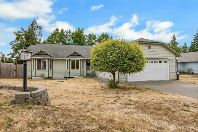 Yard was tiered to allow for rv/boat parking access to side of home behind gate.