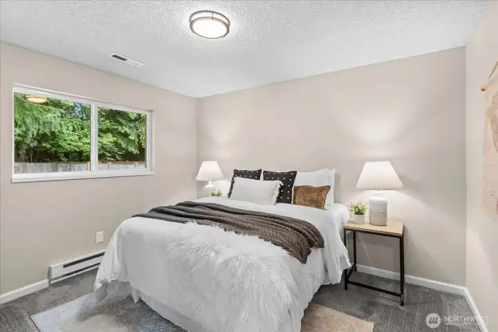 Bedroom 2 offers BRAND NEW CARPET and great natural light from the spacious backyard.